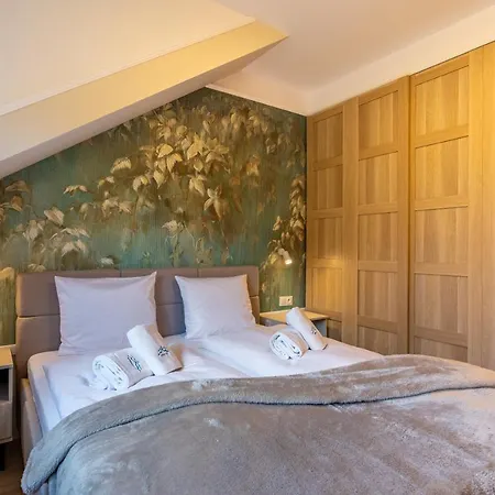 Pod Reglami 12 Invest 斯克拉斯卡波伦巴